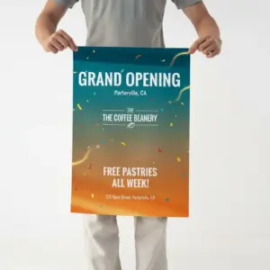 Person holding a large grand opening promotional poster with colorful gradient background